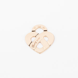 Pendentif en or jaune formant un cœur de la maison Poiray