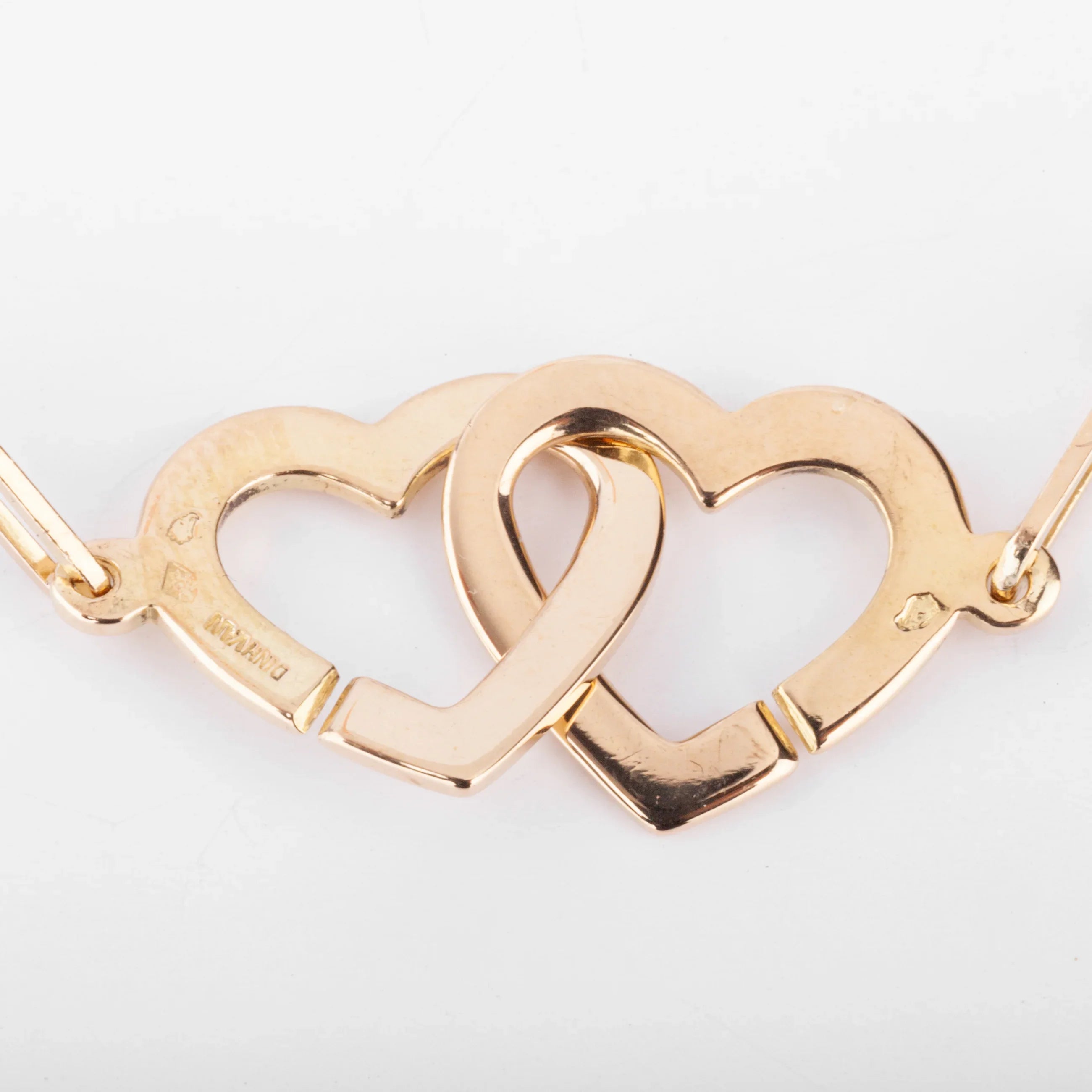 Collier or rose Dinh Van formant 2 cœurs