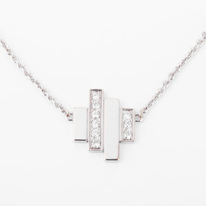 Collier or gris et diamants de la maison Dinh Van