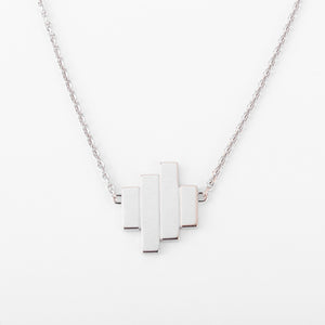 Collier or gris et diamants de la maison Dinh Van