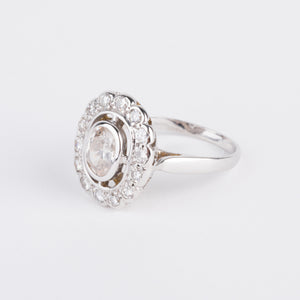 Bague marguerite en or gris et diamant