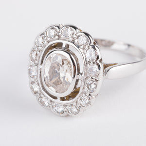 Bague marguerite en or gris et diamant