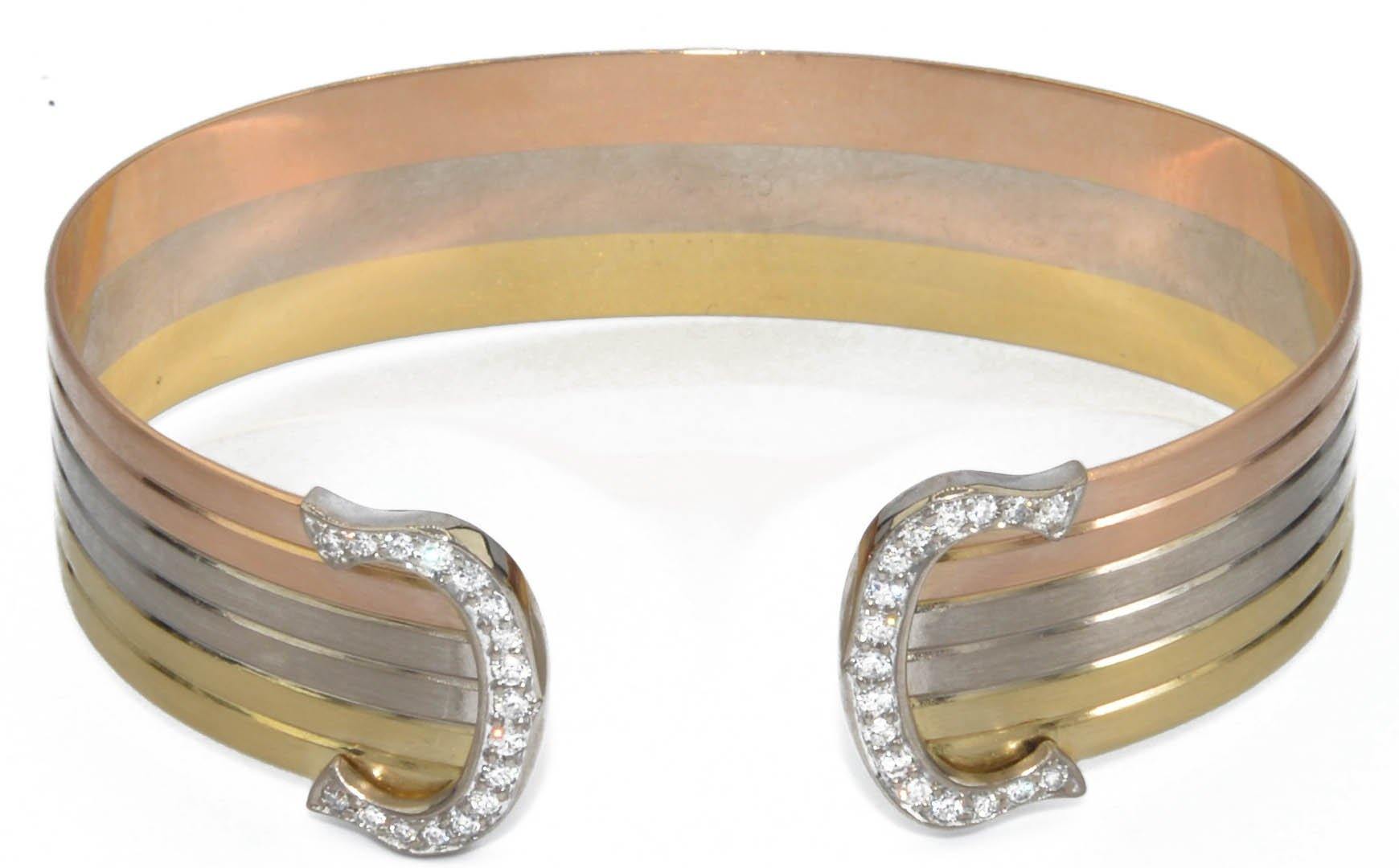 Bracelet de la maison Cartier modèle les 2 C - adalgyseboutique