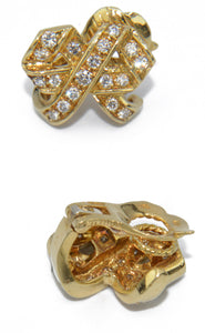 Boucles d'oreilles signée de la maison Dior en or jaune et diamant