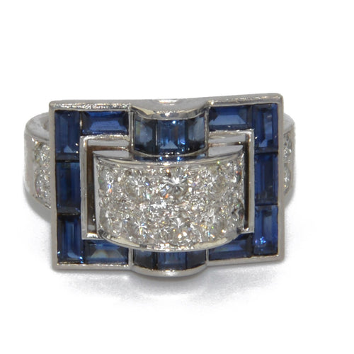 Bague en or gris et saphirs bleus calibrés