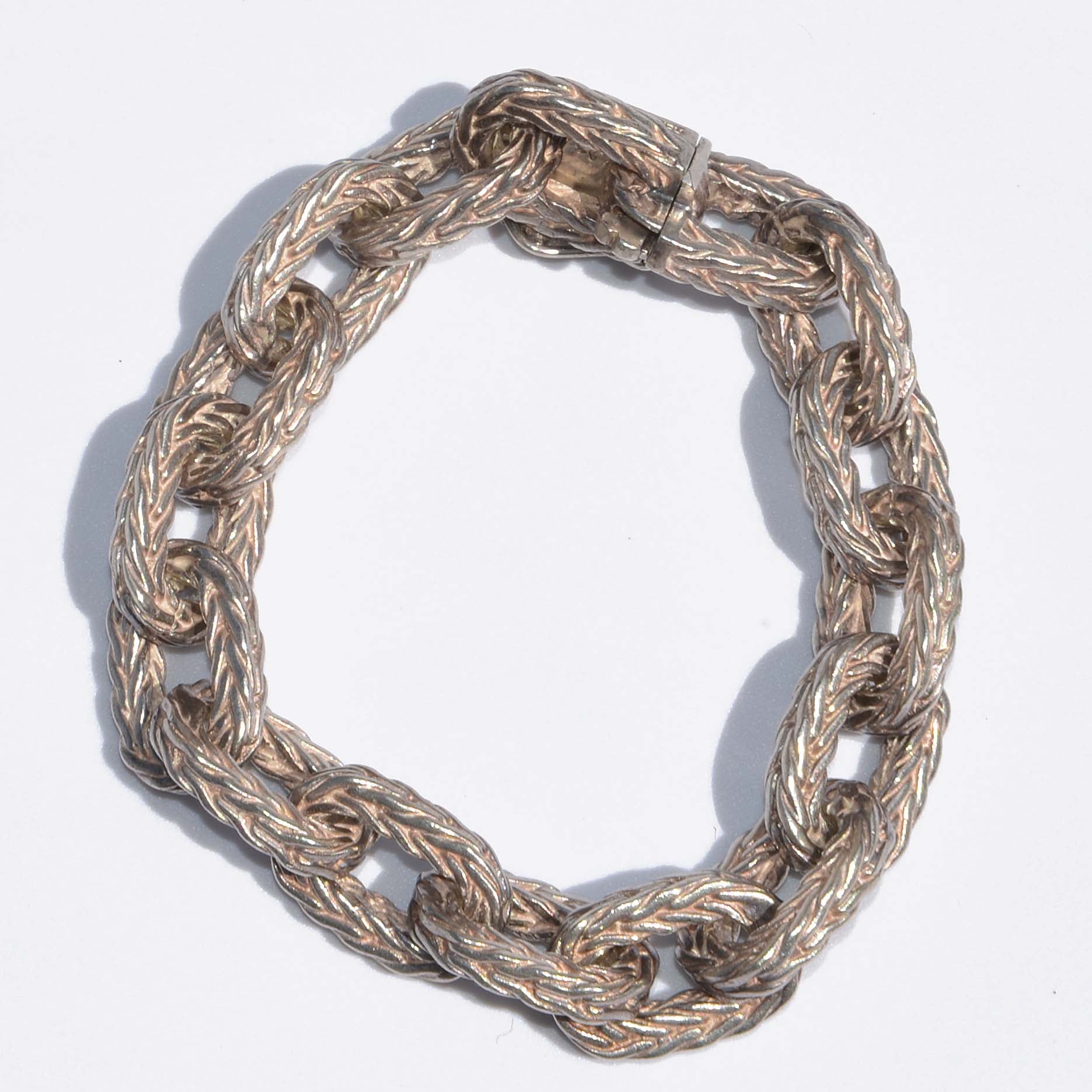 Bracelet en argent Hermès maillons tressés