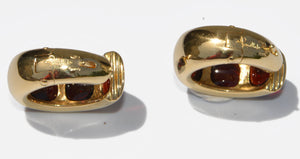 Boucles d'oreilles en or jaune de la maison Pomellato avec des cabochons de grenats