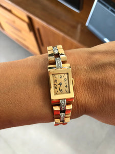 Montre tank or platine et diamant