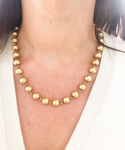 Collier Marseillais en or jaune orné de boules d'or