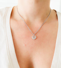 Charger l&#39;image dans la galerie, Un pendentif or gris signé de la maison Chopard
