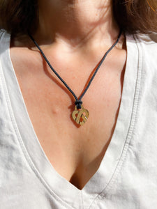 Pendentif en or jaune formant un cœur de la maison Poiray