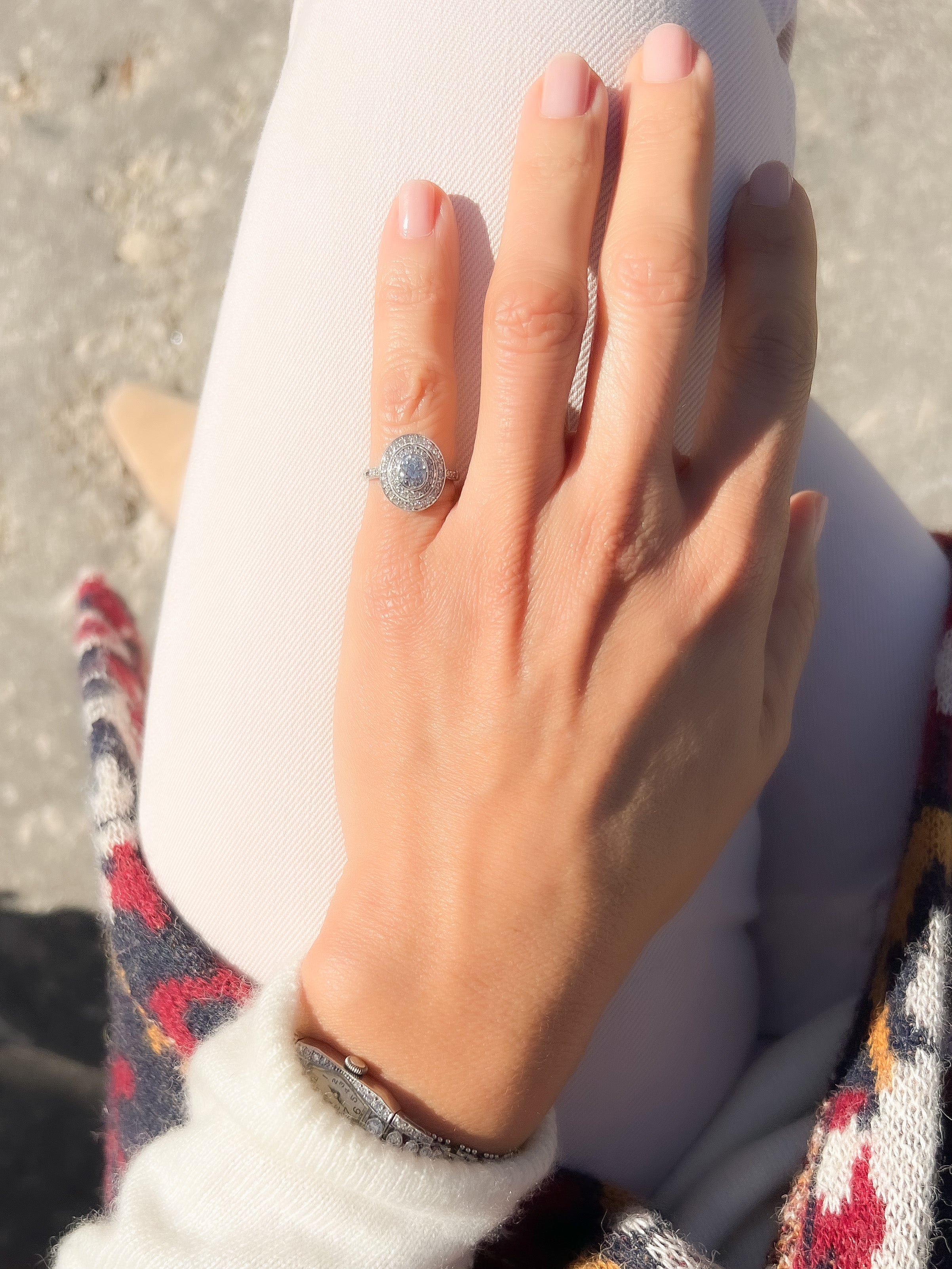 Bague double entourage en platine et diamants