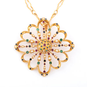 Pendentif et broche or jaune du créateur grec Lalaounis ornée de pierres précieuses