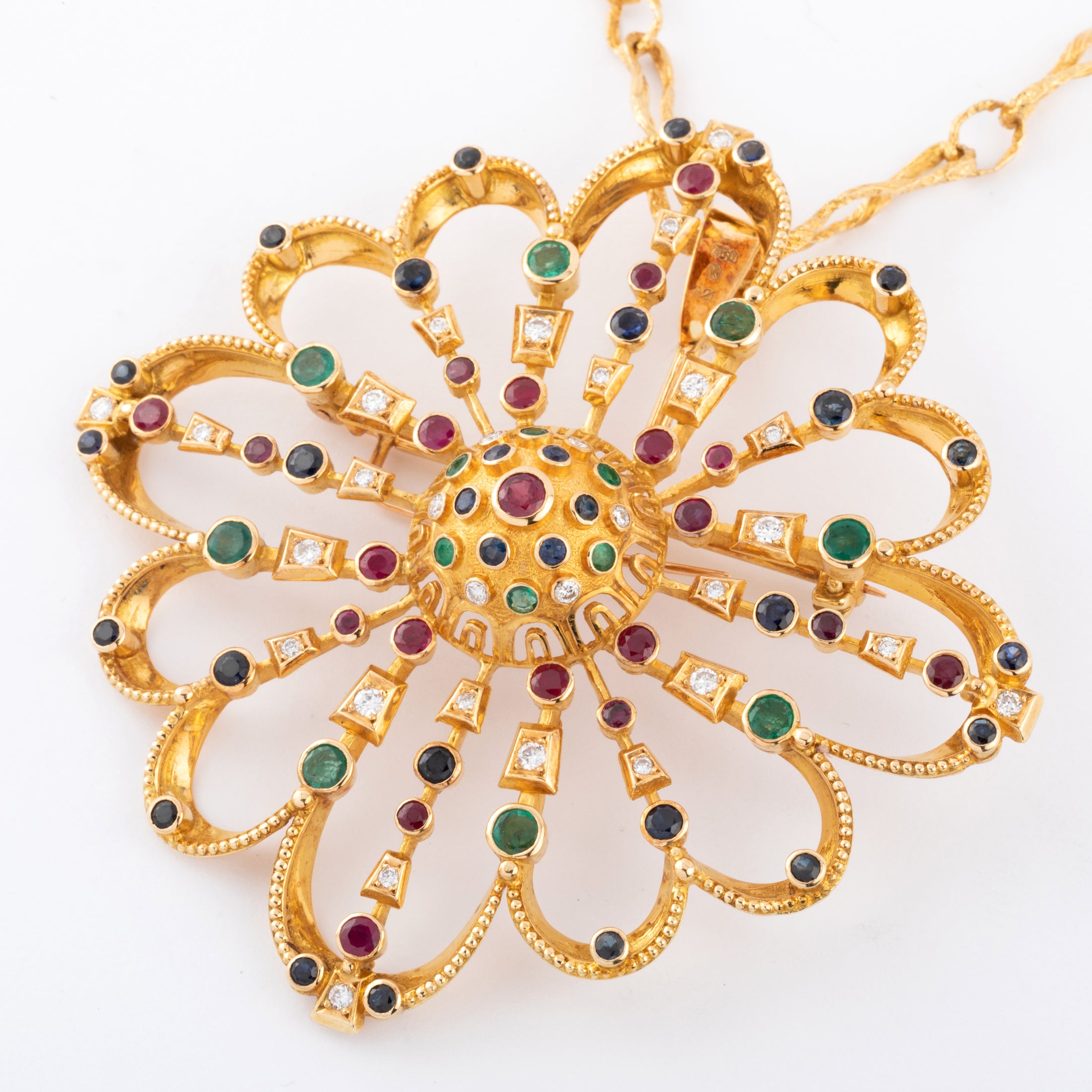 Pendentif et broche or jaune du créateur grec Lalaounis ornée de pierres précieuses