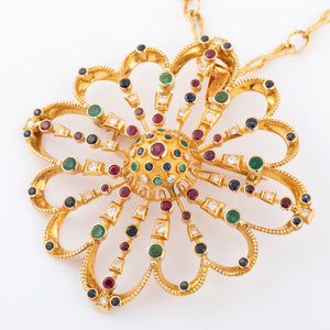 Pendentif et broche or jaune du créateur grec Lalaounis ornée de pierres précieuses