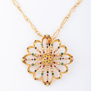 Pendentif et broche or jaune du créateur grec Lalaounis ornée de pierres précieuses