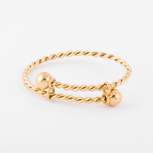 Bracelet jonc en or jaune torsadé