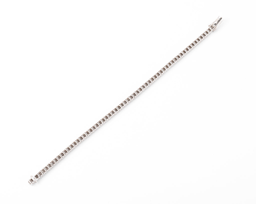 Bracelet ligne en diamant taille princesse sur or gris