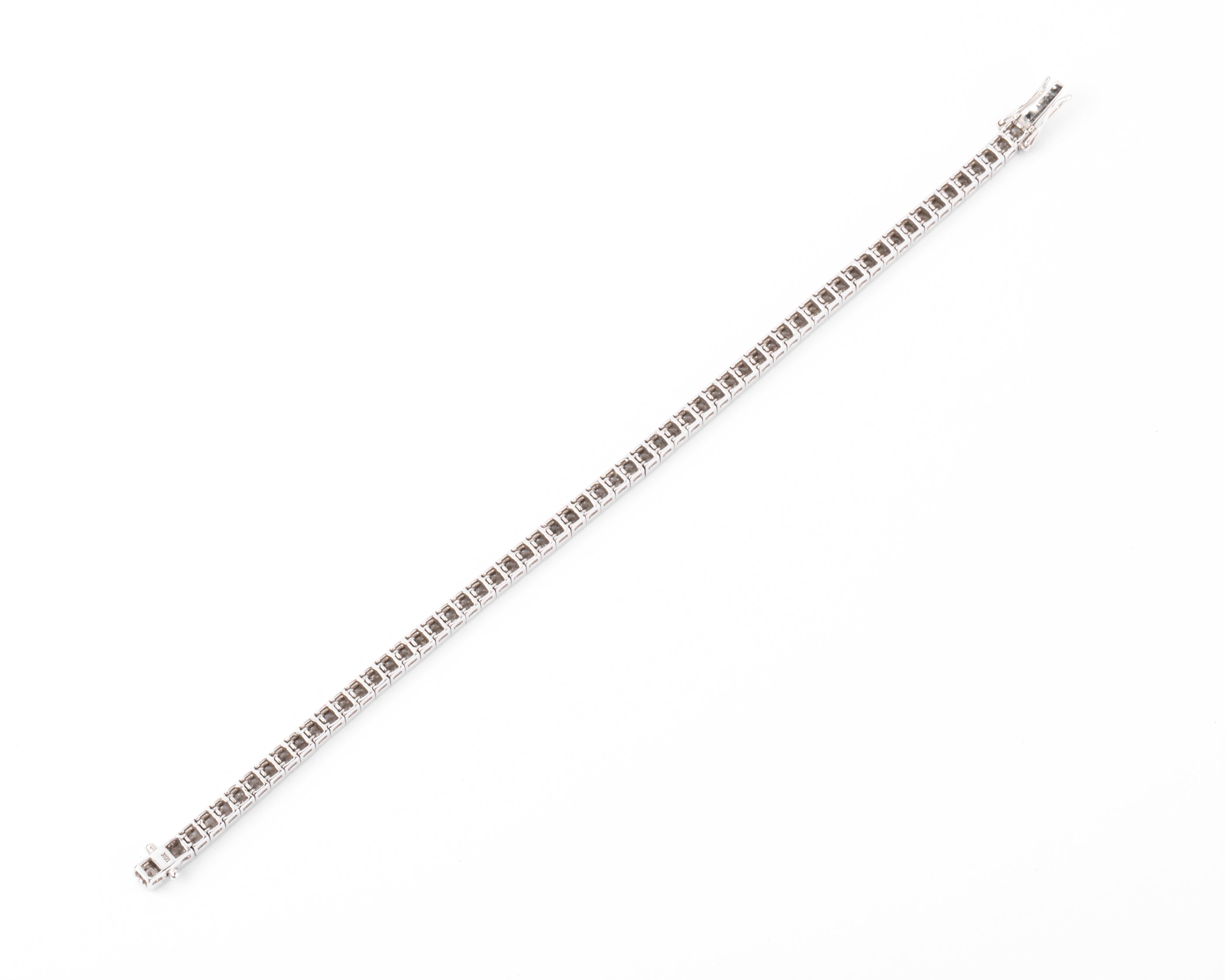 Bracelet ligne en diamant taille princesse sur or gris