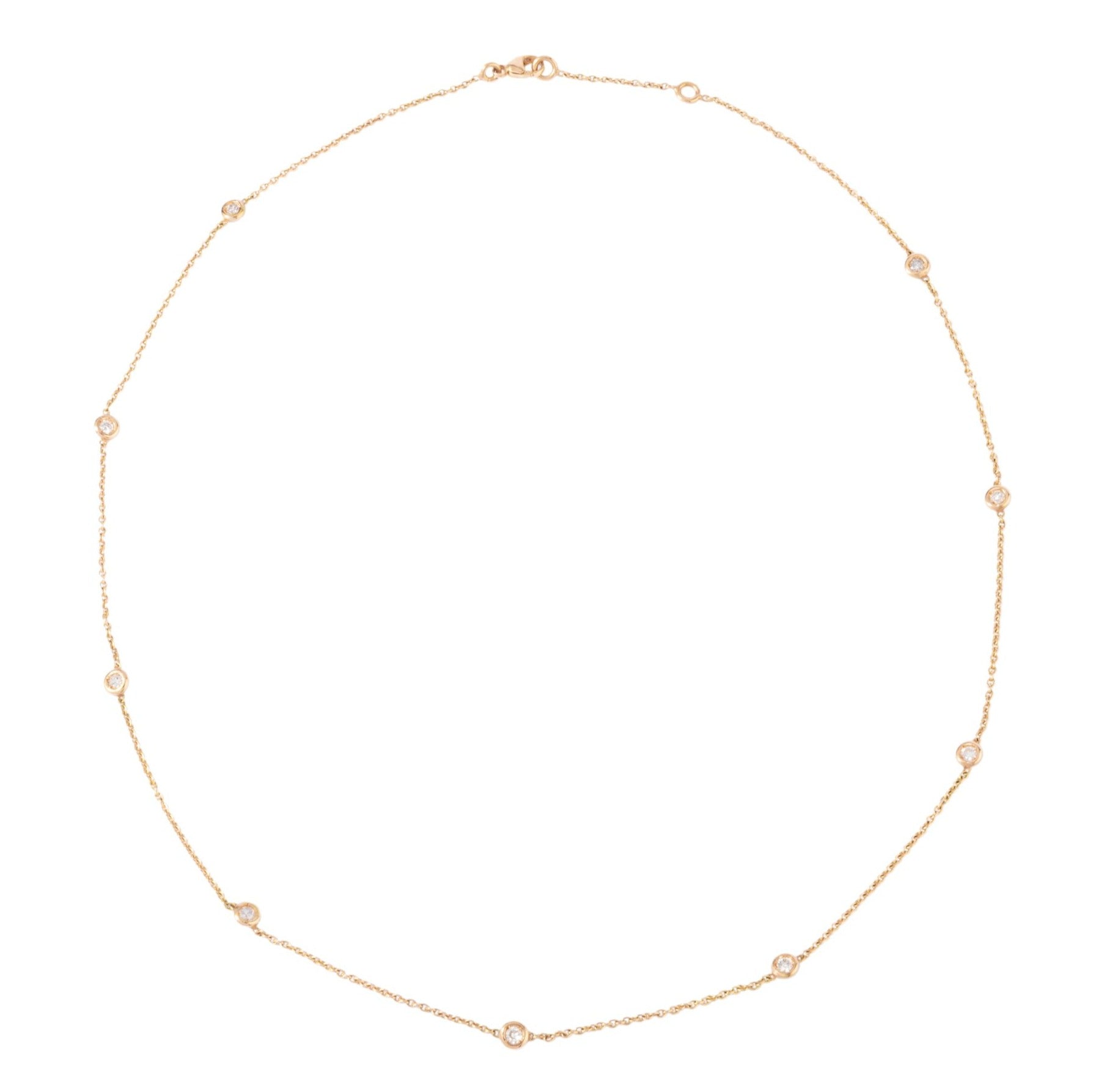 Collier or jaune intercalé de diamant sur maille forçat