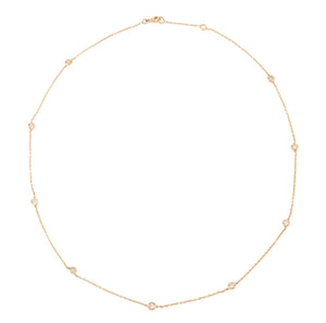 Collier or jaune intercalé de diamant sur maille forçat
