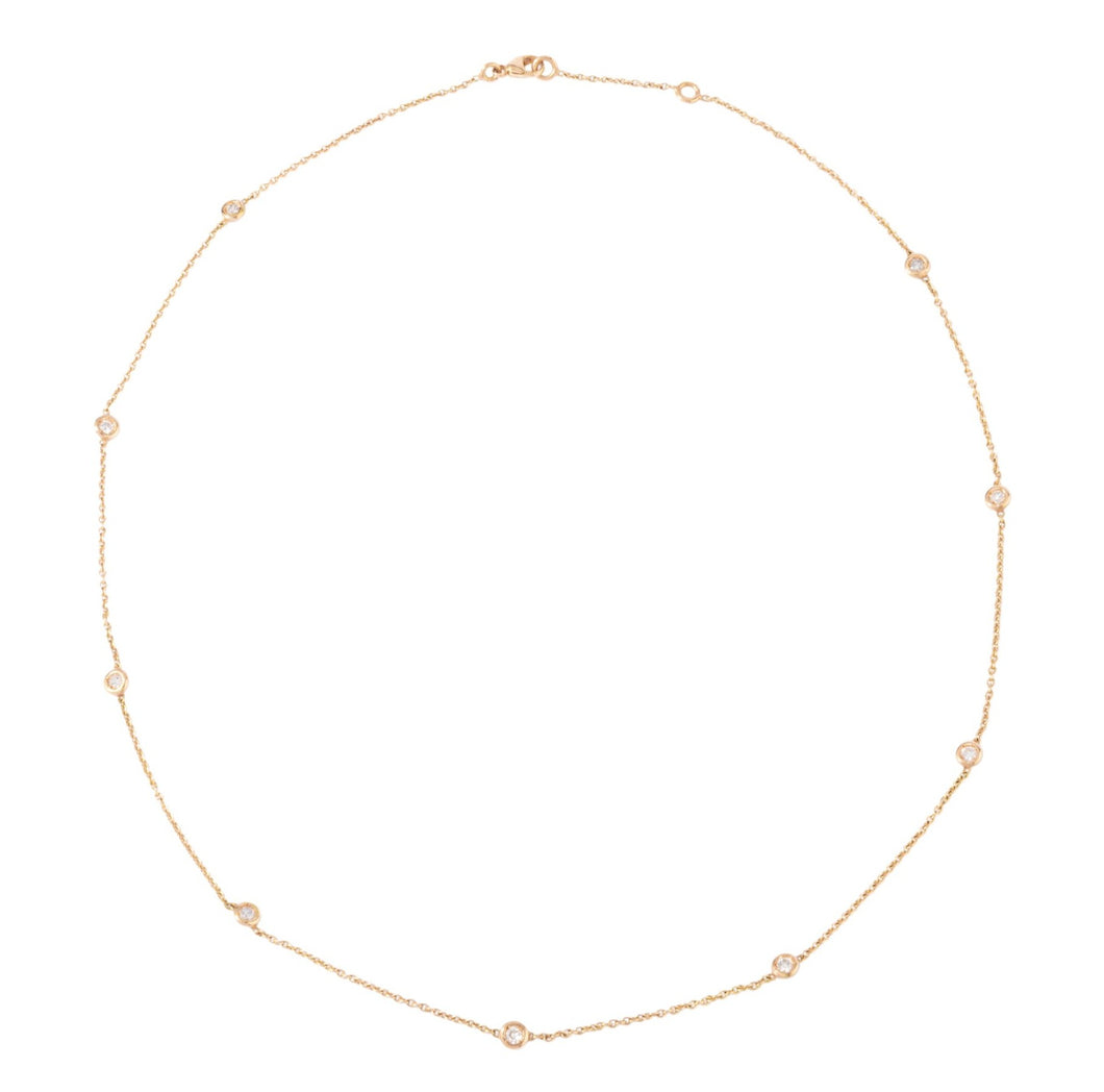 Collier or jaune intercalé de diamant sur maille forçat