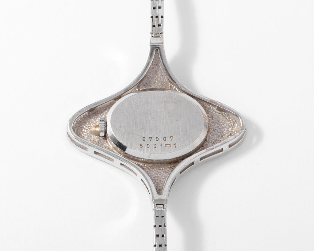 Montre ovale Or gris diamants Chopard année 1970