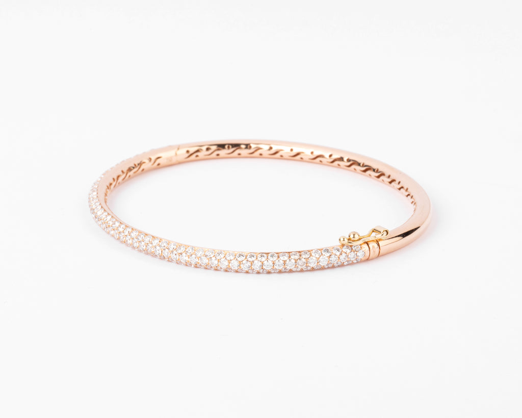 bracelet jonc ouvrant en or rose serti de 3 lignes de diamant