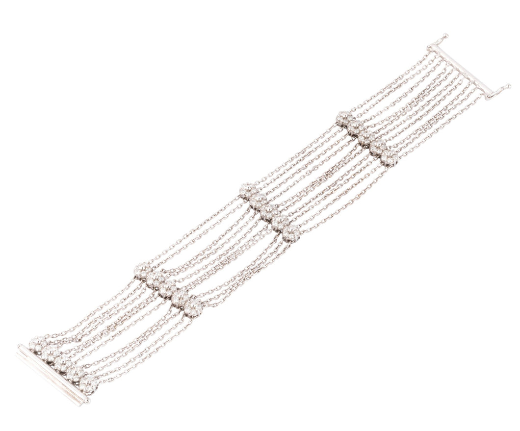 Bracelet or gris et diamant sur chaine força limée alternée de 4 motifs avec des fleurs