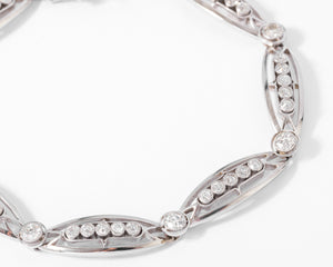 Bracelet or platine et et diamant formant des maillons ovales