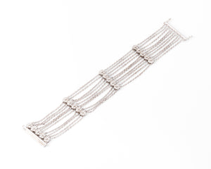 Bracelet or gris et diamant sur chaine força limée alternée de 4 motifs avec des fleurs